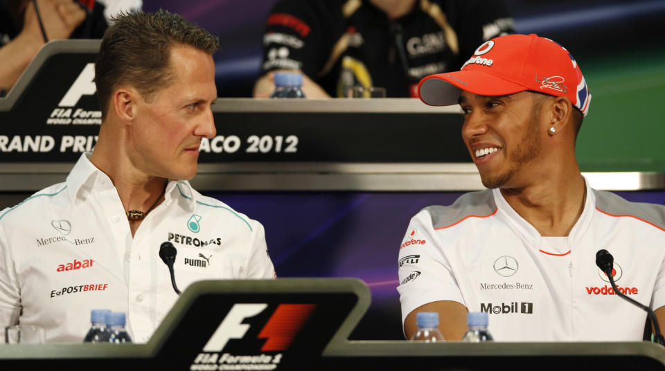 Michael Schumacher and Lewis Hamilton together before the 2012 Monaco Grand Prix