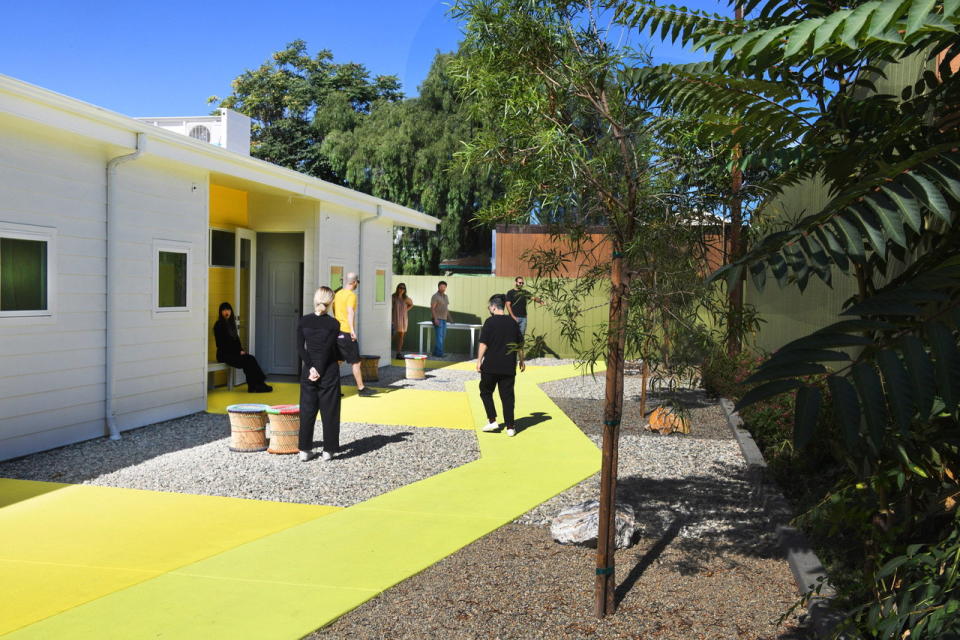 Willowbrook Apartments residents bond in the building's communal courtyard space.