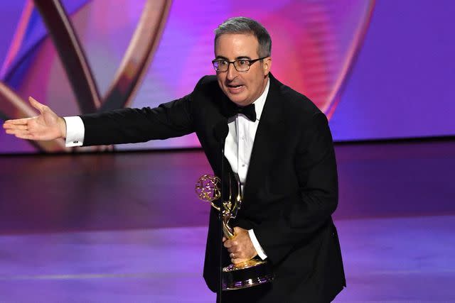 <p>VALERIE MACON/AFP via Getty </p> John Oliver at the 2024 Emmys.