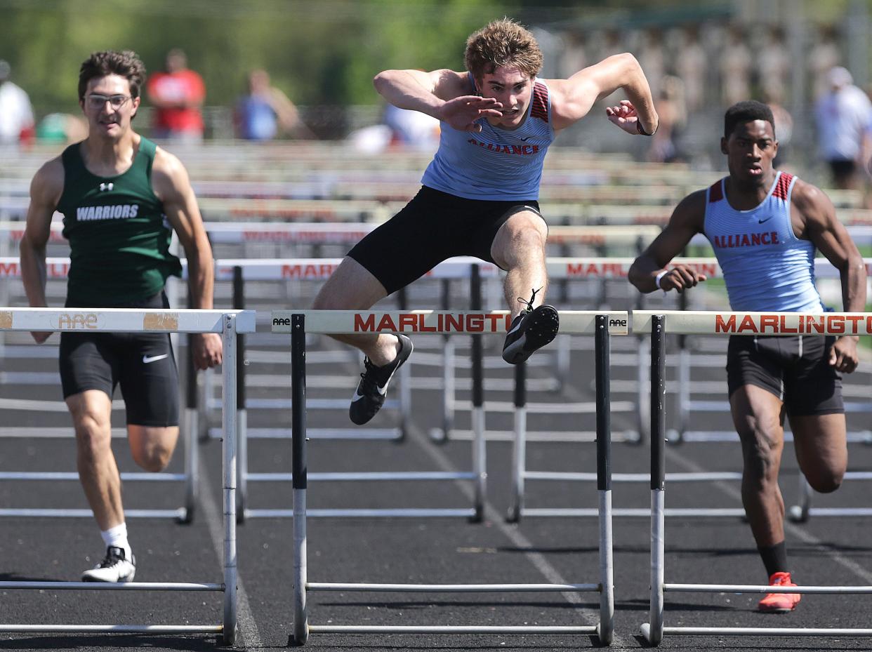 Alliance's Brendan Zurbrugg on his way to victory in the 110-meter hurdles Saturday at the Eastern Buckeye Conference track & field championships.