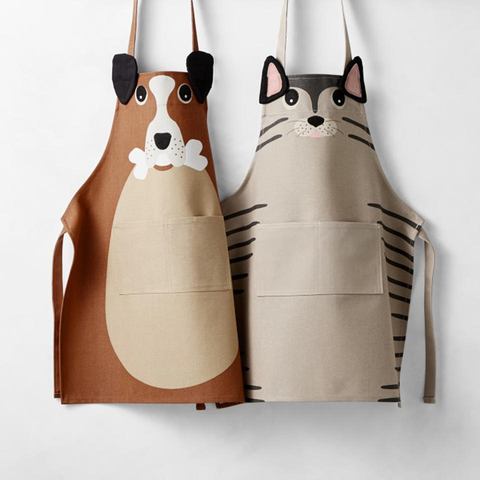 <p>Your little sous chef is about to be dressed to impress with their new dog- or cat-themed apron. Cookie decorating, meatball making, ice cream sandwich assembling—they're no match for this fun and functional kids' Christmas gift. <a href="https://williams-sonoma.pdy5.net/c/249354/265127/4291?subId1=RS29GiftsUnder25ThatStillFeelSpecialmseaverGifGal2600819202011I&u=https%3A%2F%2Fwww.williams-sonoma.com%2Fproducts%2Fdog-and-cat-kid-aprons%2F" rel="nofollow noopener" target="_blank" data-ylk="slk:$25, williams-sonoma.com;elm:context_link;itc:0;sec:content-canvas" class="link ">$25, williams-sonoma.com</a></p>