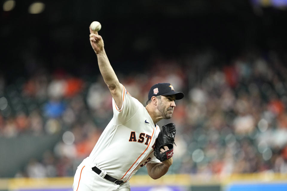 Houston Astros starting pitcher Justin Verlander throws against the Philadelphia Phillies during the first inning of a baseball game Tuesday, Oct. 4, 2022, in Houston. (AP Photo/David J. Phillip)