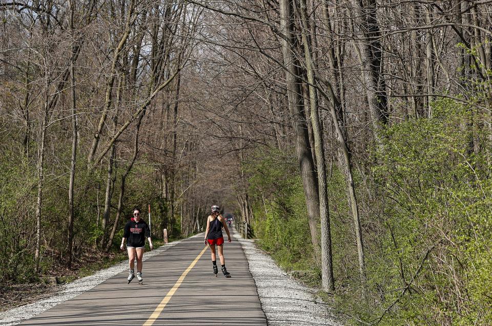 People ride bikes, walk, and roller blade down the Monon Trail in Carmel in an IndyStar file photo.