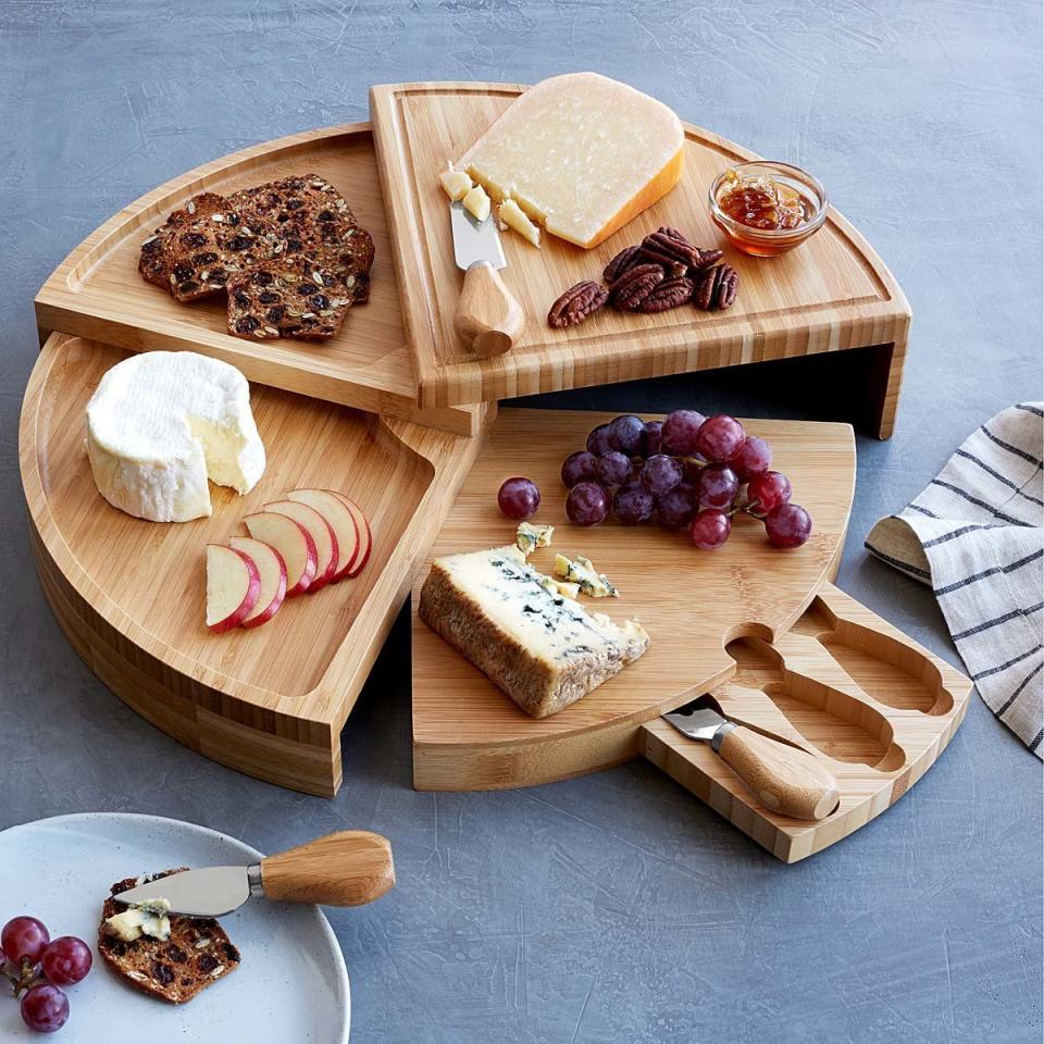 1) Compact Swivel Cheese Board With Knives