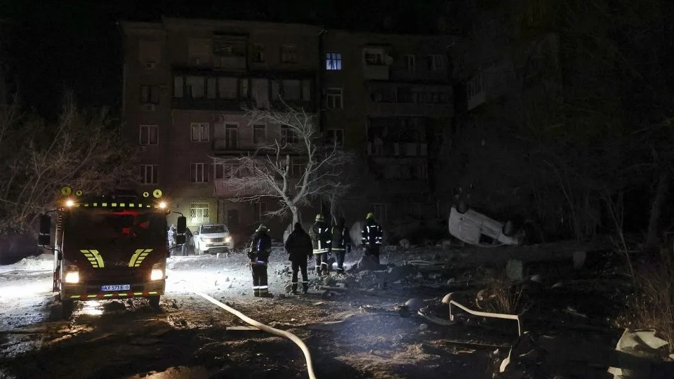 Emergency service teams respond to damage in Kharkiv, eastern Ukraine, December 8, 2023. - Sergey Kozlov/EPA-EFE/Shutterstock