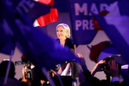 Marine Le Pen, French National Front political party leader, celebrates after early results in the first round of 2017 French presidential election, in Henin-Beaumont, France. REUTERS/Charles Platiau