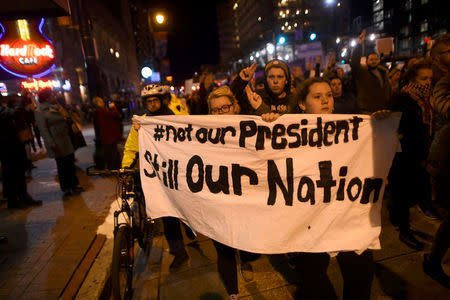 Demonstrators protest in response to the election of Republican Donald Trump as the president of the United States in Philadelphia, Pennsylvania, U.S. November 11, 2016. REUTERS/Mark Makela