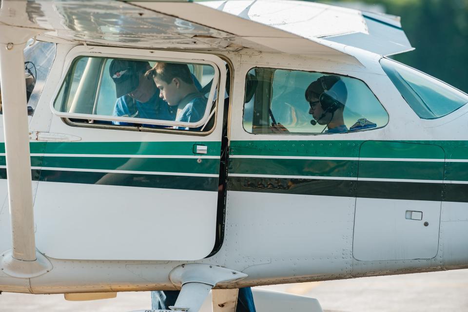 Students review flight controls before takeoff Saturday at Harry Clever Field in New Philadelphia. They completed the Wright Flight course offered by Experimental Aircraft Assocation Chapter 1077.