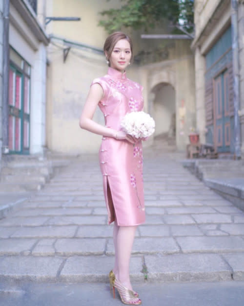 Crystal welcomed the Year of the Ox in ravishing red and demure pink