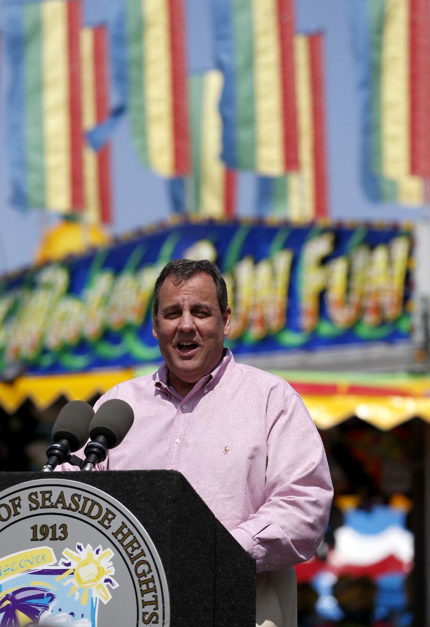 New Jersey Gov. Chris Christie talks during a news conference following a visit to the Seaside Heights boardwalk, Friday, April 25, 2014, in Seaside Heights, N.J. Christie visited the boardwalk to see progress following last September's massive fire that burned down the Seaside Park side of the boardwalk. Previously, the boardwalk had been rebuilt following Superstorm Sandy. Investigators determined the fire started in wiring under the boardwalk in Seaside Park that had been damaged by exposure to storm water from Sandy. (AP Photo/Julio Cortez)