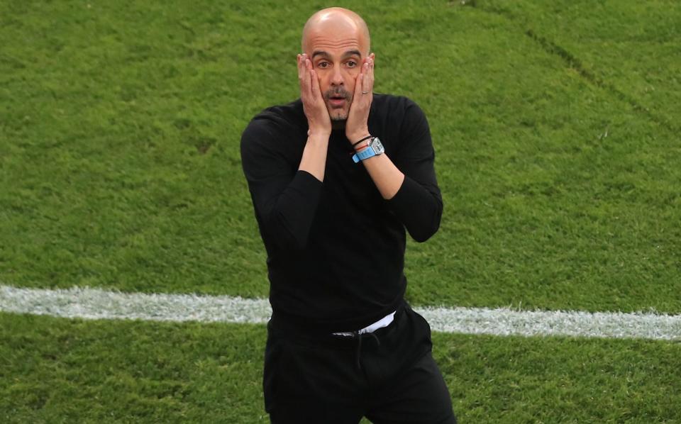  Pep Guardiola, Manager of Manchester City reacts during the UEFA Champions League Final - Marc Atkins/Getty Images