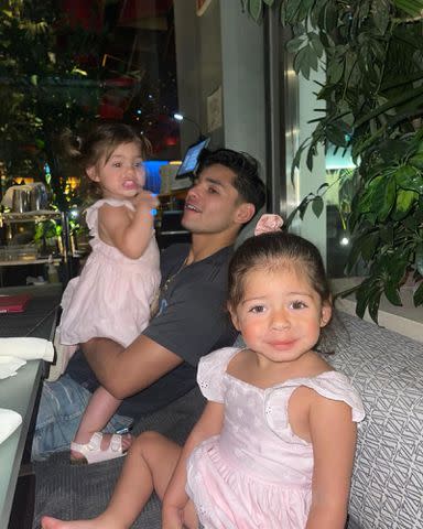 <p>Ryan Garcia Instagram</p> Ryan Garcia and his daughters, Bela and Rylie.
