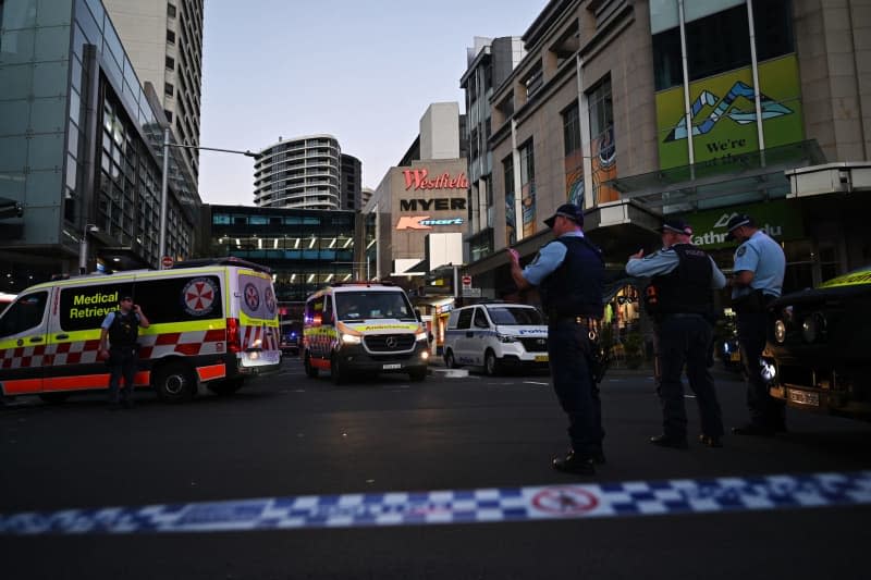 Emergency services are seen at Bondi Junction after multiple people were stabbed inside the Westfield Bondi Junction shopping centre in Sydney. A shopping centre is in lockdown in Sydney's eastern suburbs after multiple people were stabbed and a man was shot by police. Steven Saphore/AAP/dpa