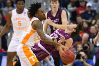 <p>Jordan Bowden #23 of the Tennessee Volunteers collides with Jack Ferguson #13 of the Colgate Raiders in the first round of the 2019 NCAA Men’s Basketball Tournament held at Nationwide Arena on March 22, 2019 in Columbus, Ohio. (Photo by Jamie Schwaberow/NCAA Photos via Getty Images) </p>