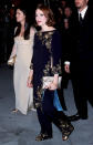 <p>Looking elegant in a gold embellished Versace tunic with matching pants. <i>(Photo by J. Vespa/WireImage)</i></p>