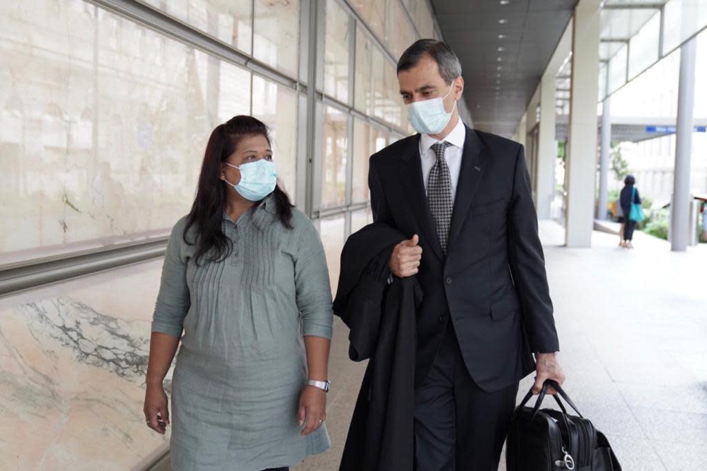 Parti Liyani and her lawyer Anil Balchandani exiting the High Court on 4 September after her acquittal. (Photo: Grace Baey)