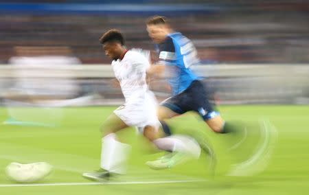 Football Soccer - TSG 1899 Hoffenheim v Bayern Munich - German Bundesliga - Rhein-Neckar-Arena, Sinsheim, Germany - 4/4/17 - Bayern Munich's Kingsley Coman and Hoffenheim's Andrej Kramaric in action REUTERS/Kai Pfaffenbach