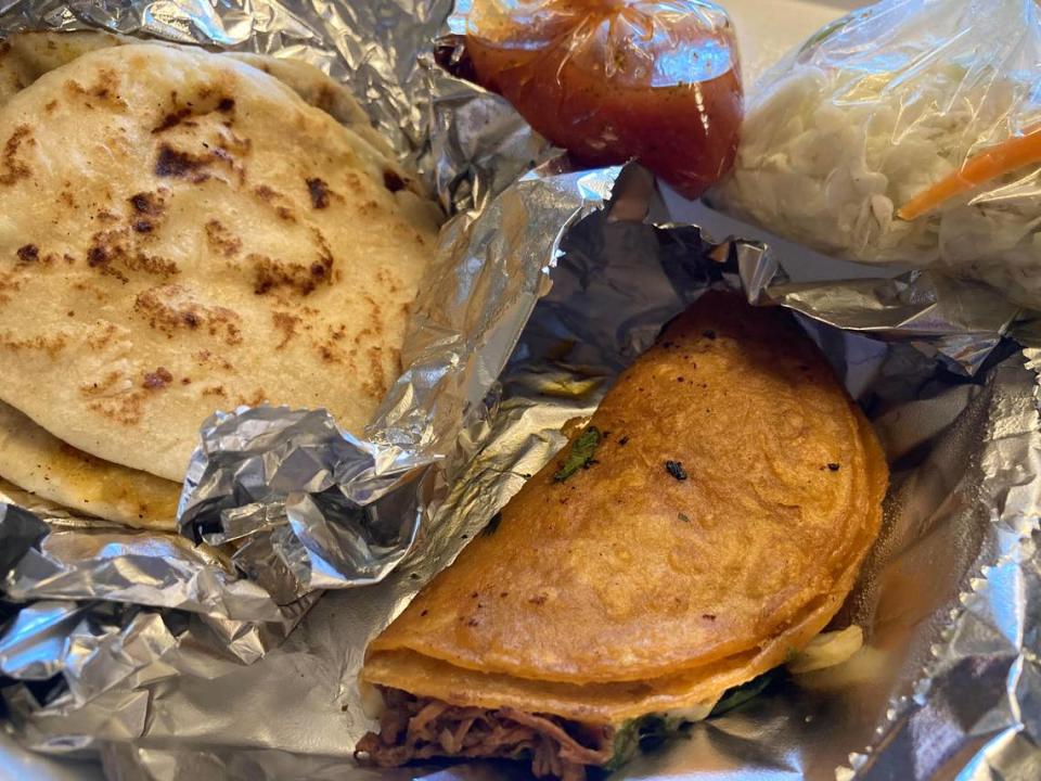 Pupusas with pickled cabbage and red sauce and a birria taco from Delicias Salvadorenas at 415 Green St. in Warner Robins.