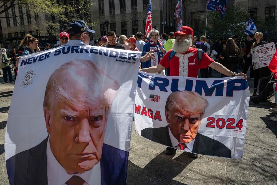 Supporters of former President Donald Trump outside the Manhattan Criminal Courthouse for the start of first-ever criminal trial against a former president of the United States. <span class="copyright">Victor J. Blue for TIME</span>