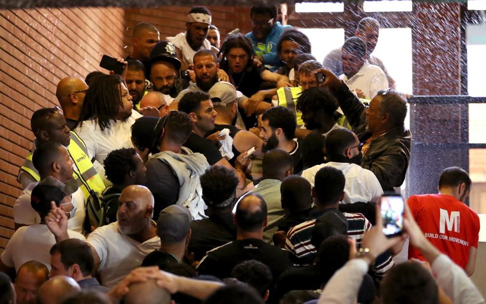  Protesters storm Kensington Town Hall  - Credit: Dan Kitwood/Getty