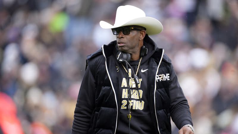 Colorado head coach Deion Sanders looks on during a spring game on April 22, 2023, in Boulder, Colo. Sanders’ team has added 20 transfers since the portal window opened April 15, but what does the future hold for the school?