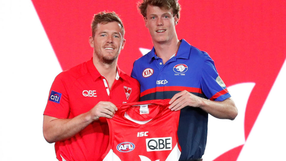 Nick Blakey poses with new teammate Luke Parker. (Photo by Michael Willson/AFL Media/Getty Images)