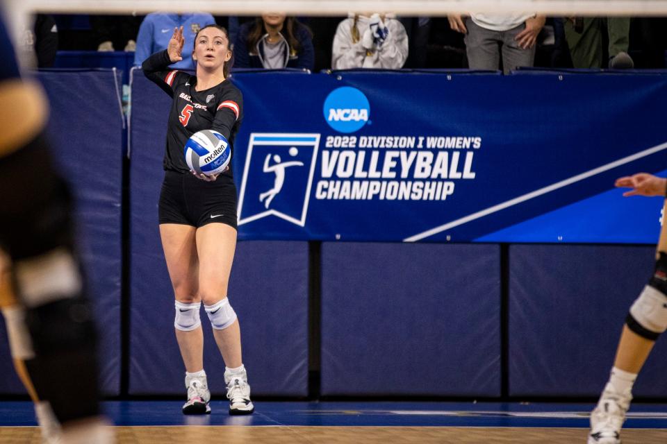 Ball State senior middle Marie Plitt prepares to serve against Marquette during the first round of the NCAA Women's Volleyball Tournament at Marquette's Al McGuire Center Thursday, Dec. 1, 2022.