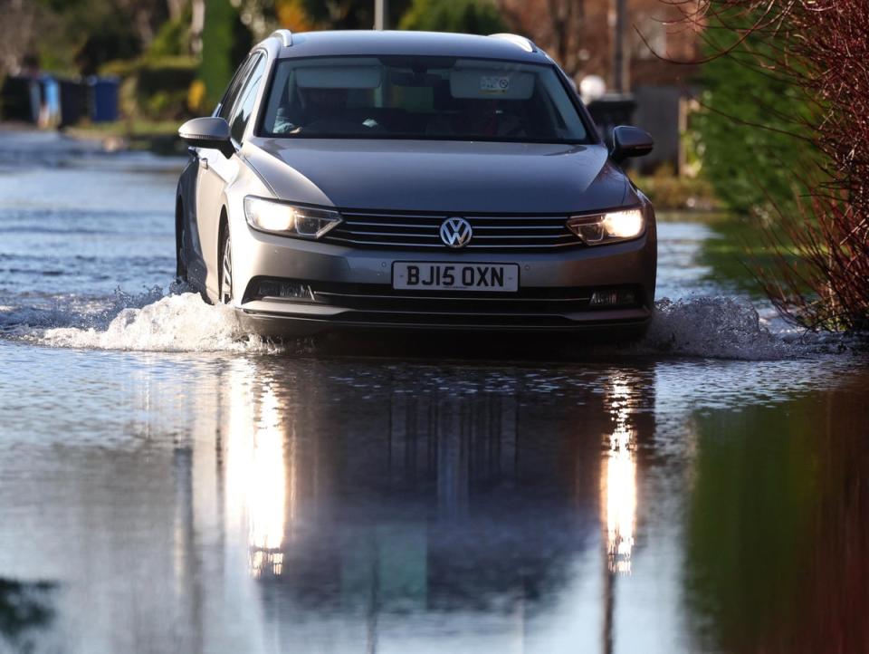 It’s feared places could be flooded as snow melts and rains move in (EPA)