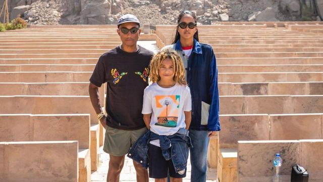 Pharrell Williams supported by wife Helen and son Rocket as he
