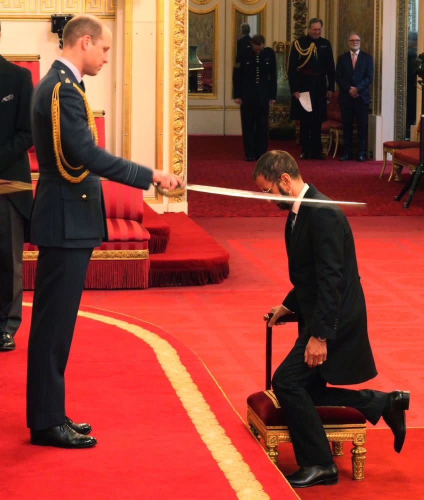 Ringo Starr is knighted by Prince William on March 20, 2017 at Buckingham Palace.