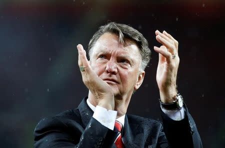 Britain Football Soccer - Manchester United v AFC Bournemouth - Barclays Premier League - Old Trafford - 17/5/16Manchester United manager Louis van Gaal applauds fans during a lap of honour after the gameAction Images via Reuters / Carl Recine