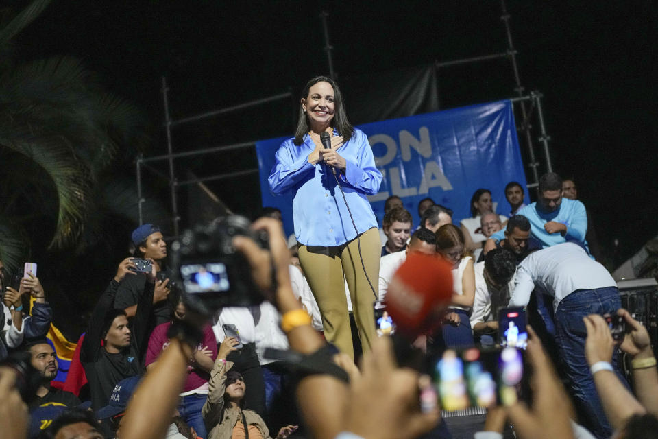 Opposition presidential hopeful Maria Corina Machado celebrates with supporters her victory in the opposition primary election, at her campaign headquarters in Caracas, Venezuela, Monday, Oct. 23, 2023. Machado will run against President Nicolás Maduro in the 2024 presidential elections. (AP Photo/Matias Delacroix)