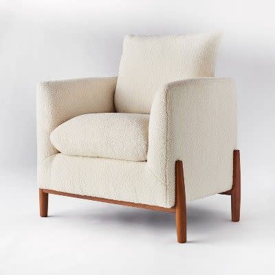 <p><strong>Threshold x Studio McGee</strong></p><p>target.com</p><p><strong>$249.00</strong></p><p><a href="https://www.target.com/p/elroy-sherpa-accent-chair-with-wood-legs-cream-threshold-8482-designed-with-studio-mcgee/-/A-79501213" rel="nofollow noopener" target="_blank" data-ylk="slk:BUY NOW;elm:context_link;itc:0;sec:content-canvas" class="link ">BUY NOW</a></p><p>Featuring thick cushions with a fleecy sherpa exterior, this accent chair is as comfy as it looks. Get the <a href="https://www.target.com/p/elroy-sherpa-round-ottoman-with-wood-legs-cream-threshold-8482-designed-with-studio-mcgee/-/A-79516558" rel="nofollow noopener" target="_blank" data-ylk="slk:matching ottoman;elm:context_link;itc:0;sec:content-canvas" class="link ">matching ottoman</a> to make your seating extra cozy. </p>