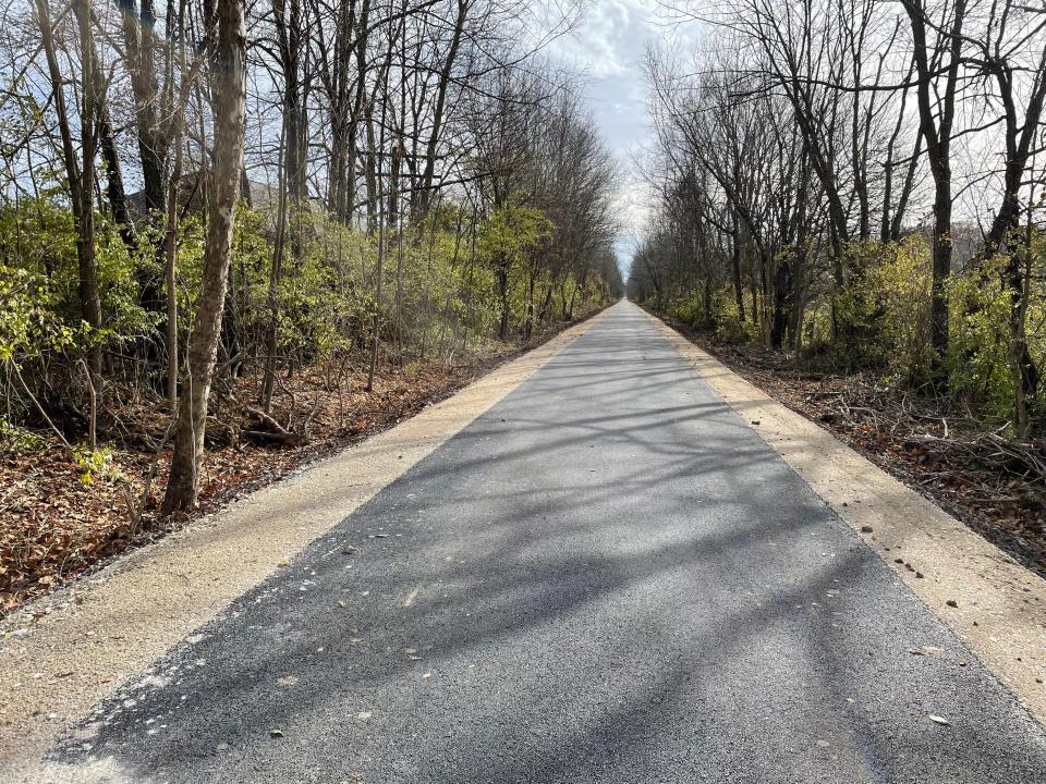 A portion of the Karst Greenway North trail is shown in November 2021. The completed trail provides a paved path between Karst Farm Park and Ellettsville.