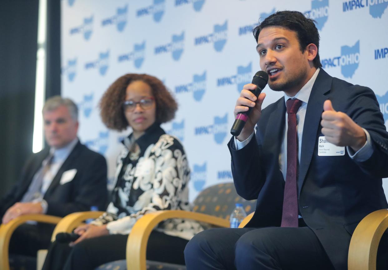 Shammas Malik answers a question during an Akron mayoral candidate forum hosted by Impact Ohio and the Greater Akron Chamber on Friday at the University of Akron's InfoCision Stadium.