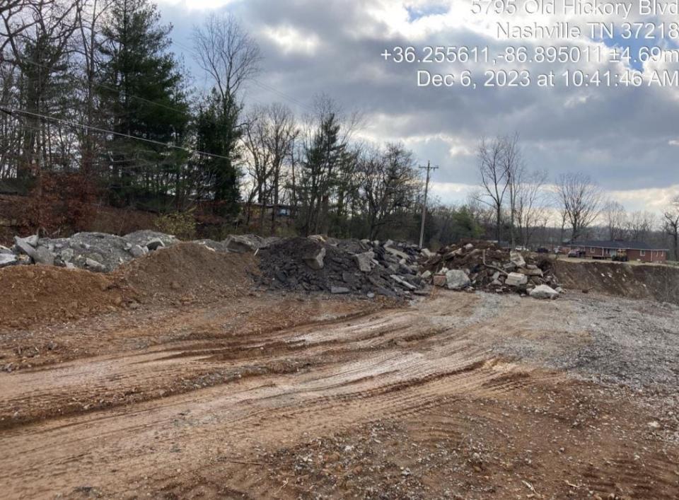 Piles of concrete, asphalt and other fill are seen at a property on Old Hickory Boulevard near Beaman Park in Nashville, as shown in Tennessee Department of Environment and Conservation inspection records dated Dec. 6, 2023.