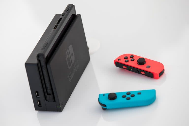 Nintendo has announced a new version of the Switch with vastly improved battery life.The updated model lasts nearly twice as long before needing a charge, according to a change on Nintendo's website.Other than the improved battery life – and the fresh components that presumably brought the change – the updated version of the Switch looks exactly like the old one and takes its place in the line-up.It comes after Nintendo announced a new Switch Lite, which is cheaper and smaller than the larger model but comes without a number of key features.According to a listing on Nintendo's website, the new model lasts roughly 4.5-9 hours, compared with approximately 2.5 to 6.5 hours on the old model. The old console will play The Legend of Zelda: Breath of the Wild for around three hours compared with five-and-a-half on the new one. Nintendo noted that the difference between the performance of the two will depend on what game is being played.Since the two consoles look identical, they can only be told apart by their serial and model number. The old ones are called HAC-001 and the new ones have the model number HAC-001(-01); the old one's serial number begins XAW, compared with the new one's XKW.Nintendo didn't reveal what had changed to give the vastly improved performance in the new console.But the company recently filed new regulatory documents that said it would have different internal components. That improved processor is presumably more efficient and so can allow the console to last for longer.Nintendo's website suggests there is no difference between the two models beyond the improved battery life.