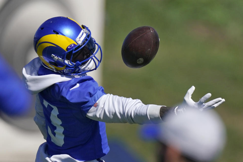 Los Angeles Rams wide receiver Odell Beckham Jr. attempts a catch during practice for an NFL Super Bowl football game Wednesday, Feb. 9, 2022, in Thousand Oaks, Calif. The Rams are scheduled to play the Cincinnati Bengals in the Super Bowl on Sunday. (AP Photo/Mark J. Terrill)