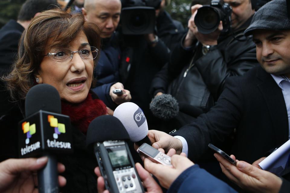 Shaaban, advisor to Syrian President Assad, speaks to the media after a meeting at the Geneva Conference on Syria at the United Nations in Geneva