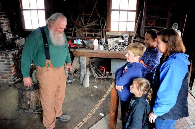 Blacksmith Rick Young, a member of the Medford Historical Society, offered a demonstration during the 2016 Apple Festival at Kirby's Mill in Medford. This year's festival is Oct. 8 from 9 a.m. to 4 p.m.