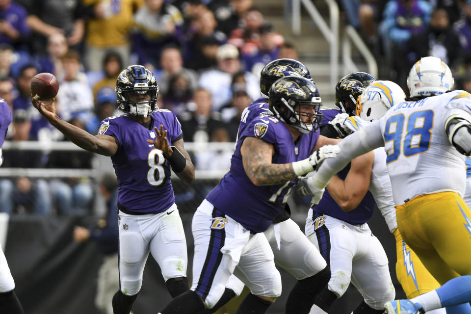 Baltimore Ravens quarterback Lamar Jackson (8) throws the ball during the second quarter of an NFL football game against the Los Angeles Chargers, Sunday, Oct. 17, 2021, in Baltimore. (AP Photo/Terrance Williams)