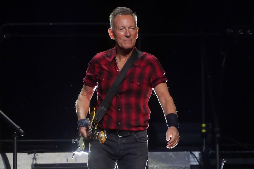 <p>John Medina/Getty </p> Bruce Springsteen performs in Phoenix, Ariz., on March 19, 2024