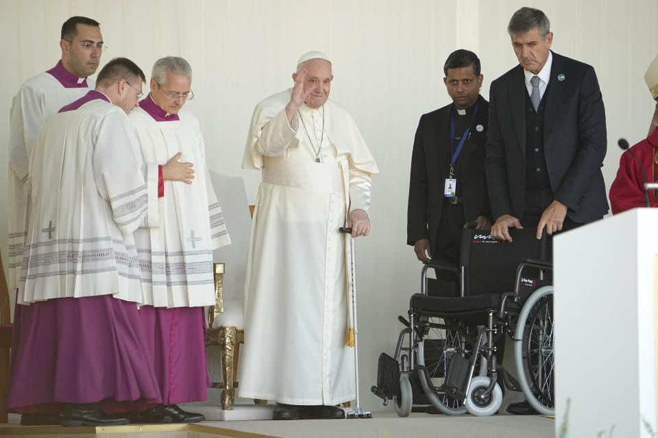 Pope Francis waves at the end of a Mass at the Expo Grounds in Nur-Sultan, Kazakhstan, Wednesday, Sep. 14, 2022. Pope Francis is on the second day of his three-day trip to Kazakhstan. (AP Photo/Alexander Zemlianichenko)