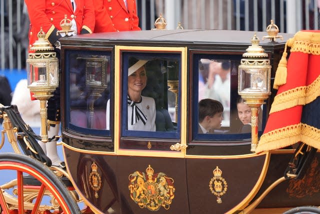 The Princess of Wales, Prince Louis and Princess Charlotte arrive for the Trooping the Colour ceremony at Horse Guards Parade 