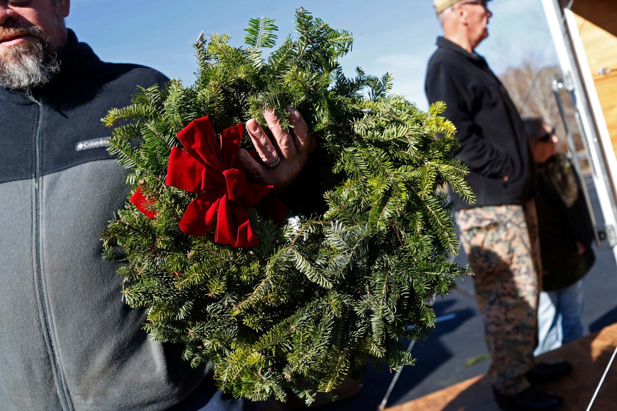A Wreaths Across America wreath at Mars Hill Baptist Church in Watkinsville, Ga., on Tuesday, Dec. 12, 2023. Wreaths Across America works to place wreaths on graves in military cemeteries all over the country.