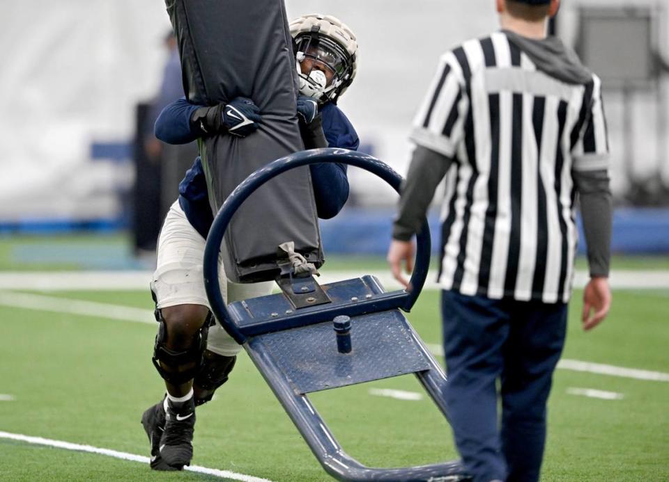 Penn State defensive tackle Zane Durant runs a drill during spring practice on Tuesday, March 14, 2023.