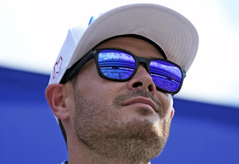 Kyle Larson looks out during introductions before a NASCAR Cup Series auto race at Texas Motor Speedway in Fort Worth, Texas, Sunday, Sept. 24, 2023. (AP Photo/LM Otero)