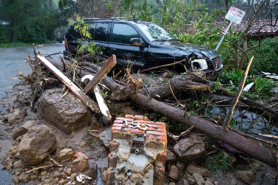 Three people have now been confirmed killed as the storms continue to rage (AP)