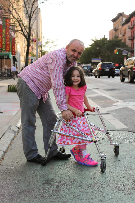 This Oct. 2, 2013 photo taken by photographer Brandon Stanton shows a portrait of Mecit Kabatas and his five year-old daughter Bayza in New York for the Humans of New York blog. Stanton’s magical blend of portraits and poignant, pithy storytelling has earned the blog more than 2 million followers online. Now Stanton is putting his work in a book, "Humans of New York," due out Oct. 15 from St. Martin’s Press. (AP Photo/Humans of New York, Brandon Stanton)