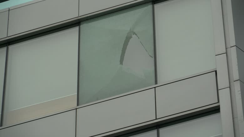 Falling glass from King Street East building closes portion of sidewalk, road